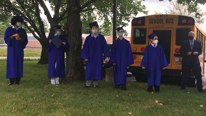 2020 graduating Forum students celebrating an outdoor graduation safely in June